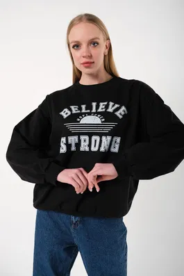 K&H TWENTY-ONE Believe Strong Black Printed Sweatshirt by Design